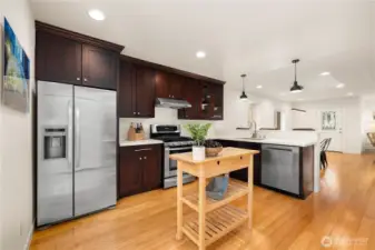 Solid countertops and a brand new dishwasher.