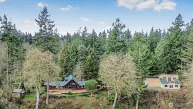 Home and shop on 5+ acres of tranquil south-end waterfront, on Camano Island.
