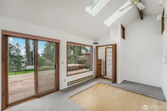 The other bedroom also has access to the outdoors and incredible views with the bonus of a large walk-in closet.