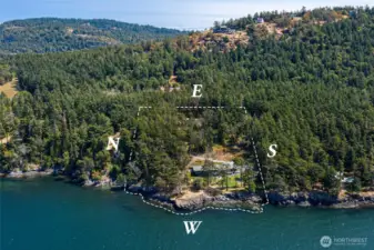 Private west side San Juan Island waterfront estate set on 6± acres with 400± feet of shoreline along Haro Strait. Clearly defined boundaries showcase the rare combination of privacy, forested acreage, and expansive west-facing waterfront.