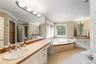 Primary Bathroom with marble counters and marble heated floors