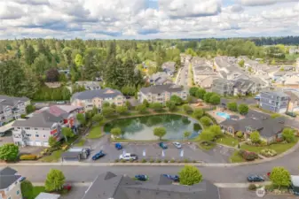 Your corner top floor unit is directly across the center of the pond.