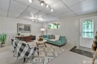 Separate outside entrance to lower level offers rental potential