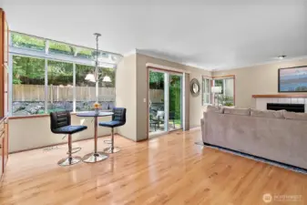 Stunning huge atrium window overlooks backyard and provides great natural light