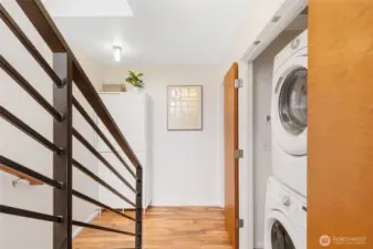 Convenient stacked washer and dryer located between both bedrooms—making laundry day simple and efficient.