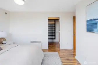Walk-in closet with built-in storage keeps your wardrobe organized and mornings stress-free.