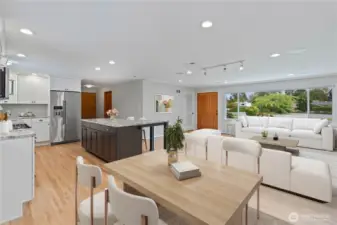 Open-concept living, dining and kitchen area- perfect for entertaining and gatherings. Bright, airy, and seamlessly connected, this space makes hosting a breeze and creates a warm, inviting atmosphere. ADA Accessible