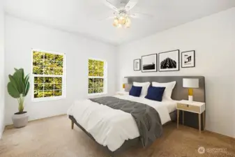 Primary bedroom also looks out onto the greenbelt.
