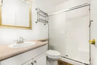 Second bathroom acts as primary bedroom en suite!