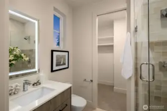 En-Suite bath w/ Touch-Controlled Backlit Mirror & Built-In closest package.