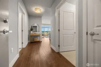 A bright, welcoming entry hall that sets the tone for the condo, featuring clean lines, warm finishes, and an inviting first impression as you step inside.