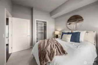 Secondary bedroom from another angle, highlighting its generous layout, natural light, and a serene view that brings the outdoors in.