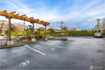 The unit comes with two parking spots—one conveniently located in the garage and an additional outdoor space.