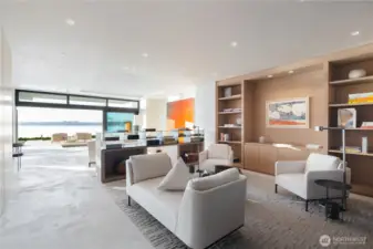 Main living and sitting areas with steel sliding walls that open the entire front of the space to the waterfront.