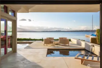 Multiple outdoor patios, built in gas fireplace and seating area..