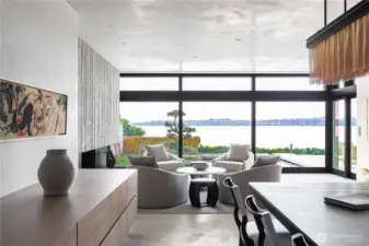 Custom cabinetry completed by local artisans. Solid nickel dining room table with seating for twelve.