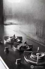 Honed stone counters and backsplash.