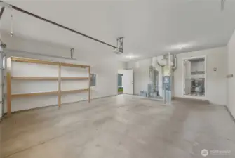 A double garage with electric door opener.