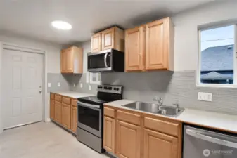 Main floor kitchen with SS appliances
