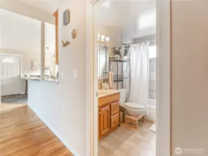 Hallway with original hardwood flooring.