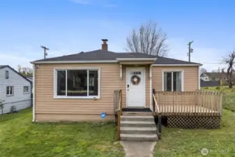Front of home with large windows