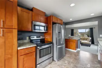 Kitchen with modern refrigerator.