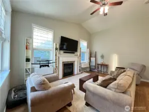 Living room w/ vaulted ceilings