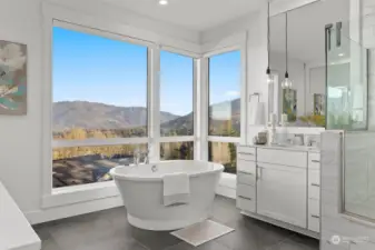 Separate soaking tub in primary bath.