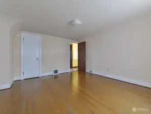 Upstairs bedroom with gorgeous hardwood floors.