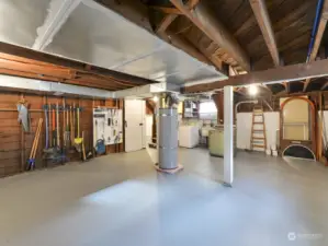 This is the large basement with a newer water heater.