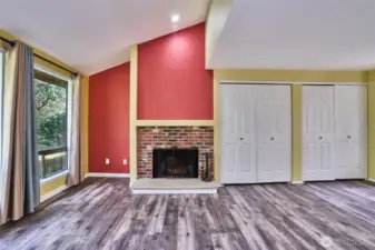 Another view displays the cozy wood burning fireplace.
