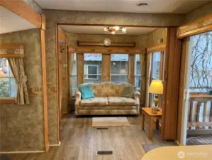 This room has a privacy curtain with a hide-a-bed for your guests.