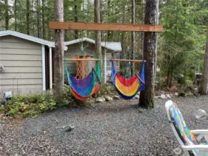 Relax by the fire in these two hammocks!