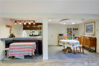Lower level kitchen w/bar seating & eating space