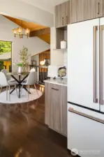 The casual dining nook is just off the kitchen. It overlooks the library plus there is a sliding glass door to the upper deck.