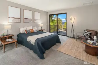 The entry level primary en suite bedroom has a private deck, a walk-in closet, and plenty of space for all of your furnishing needs.