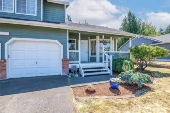Large front porch welcomes you home.
