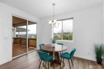 Dining area: Slider to deck with a view