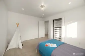 Bedrooms all have custom closet systems