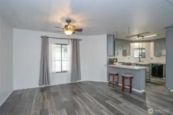 The kitchen features an eating bar, great for snacks and socializing with guests.