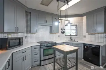 Elegant cabinets elevate the charm of this updated kitchen.