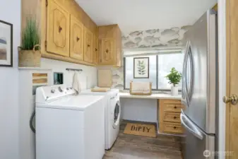 Wonderful utility room for ease of everyday function and use.