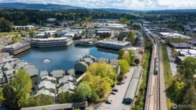 Looking South at Lake Bellevue with condos on North end of lake.  Quiet Link light rail right side of photo