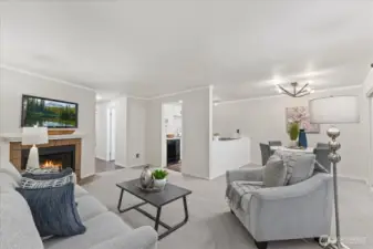 Spacious Living Area. Second floor Unit allows for natural light to flow through the Windows.