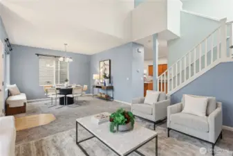 Open flow between living, dining, and kitchen areas