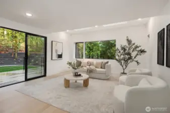 Family room with access to backyard and deck