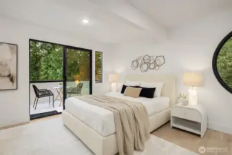 Beautiful primary bedroom with private deck