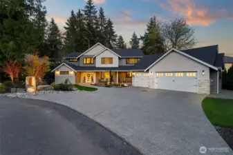 The home starts with incredible curb appeal and perfectly manicured grounds.