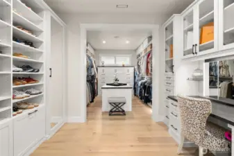 The massive primary closet with a Closets by Design closet system.