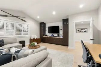 The bonus room has a built-in media center.